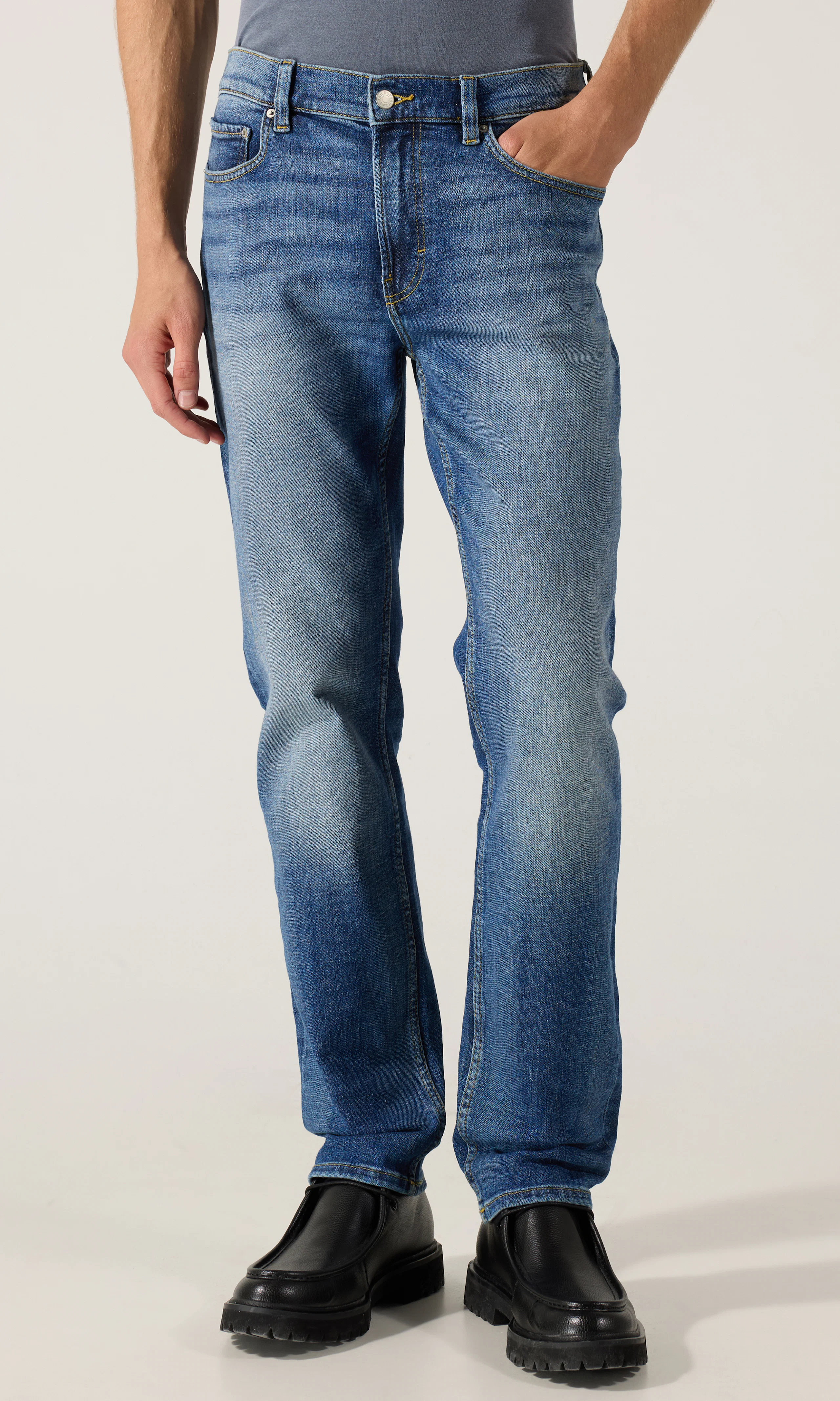 Regular Tapered Jeans. Front. Model.