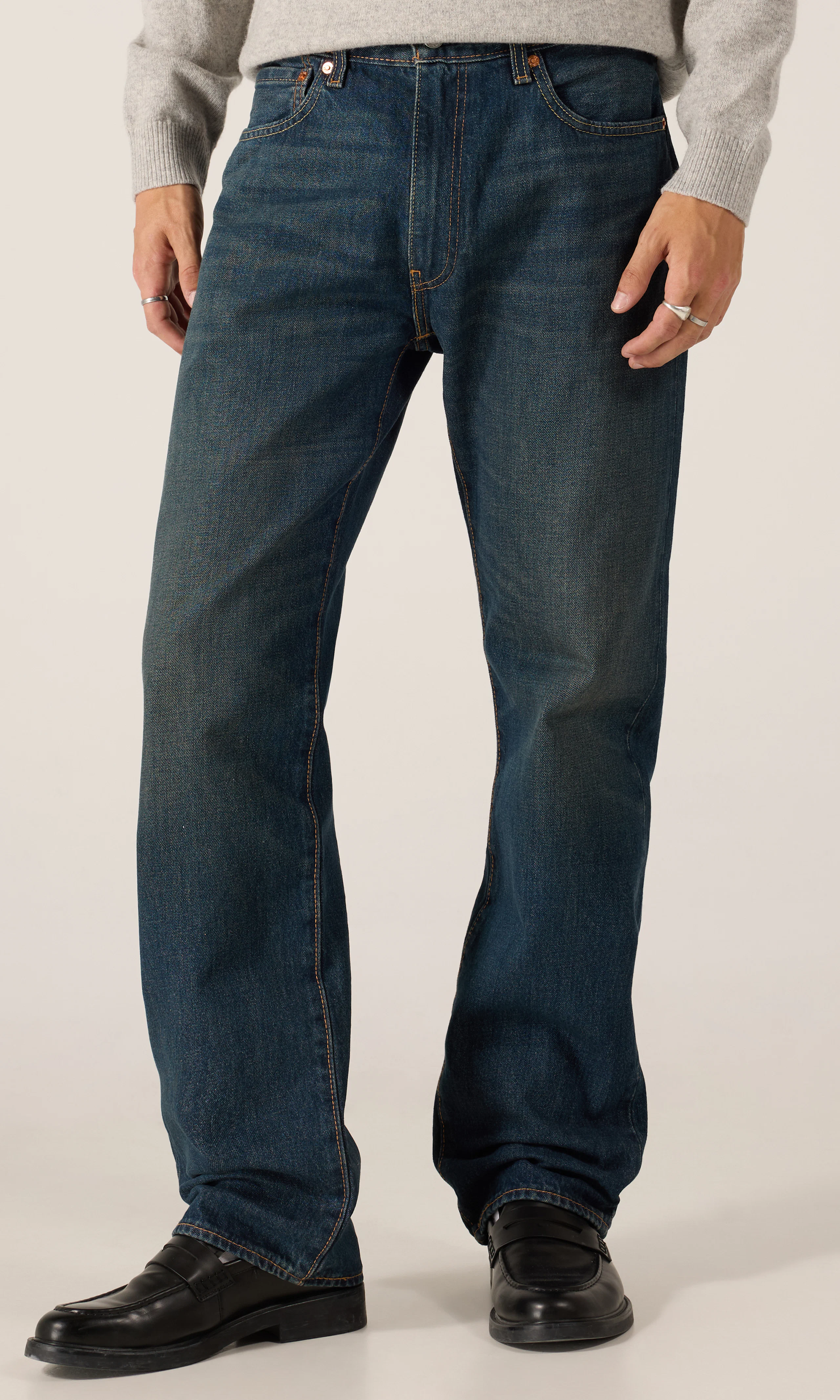 555™ Relaxed Straight Jeans. Front. Model.