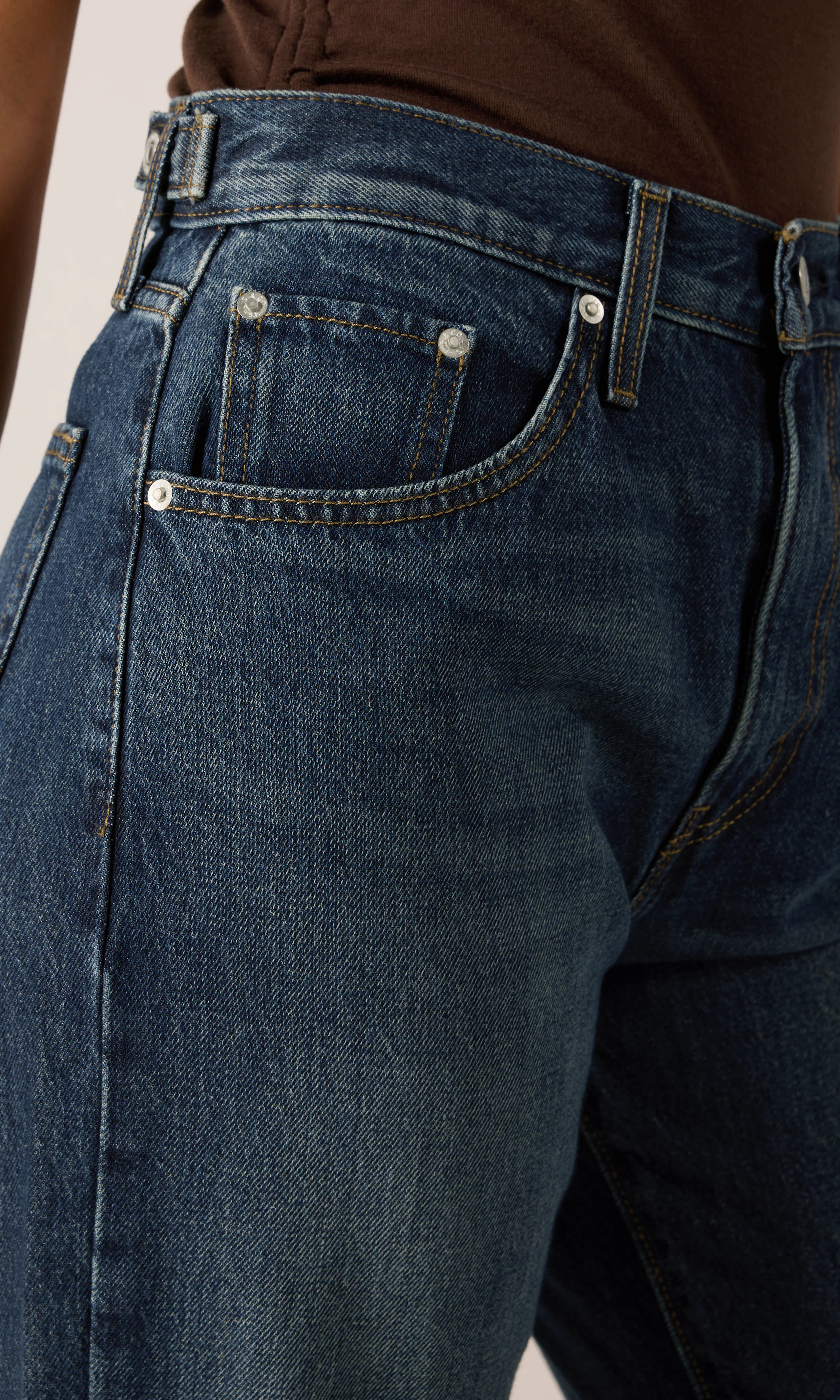 Cinch Flare Jeans. Detail 2. Model.
