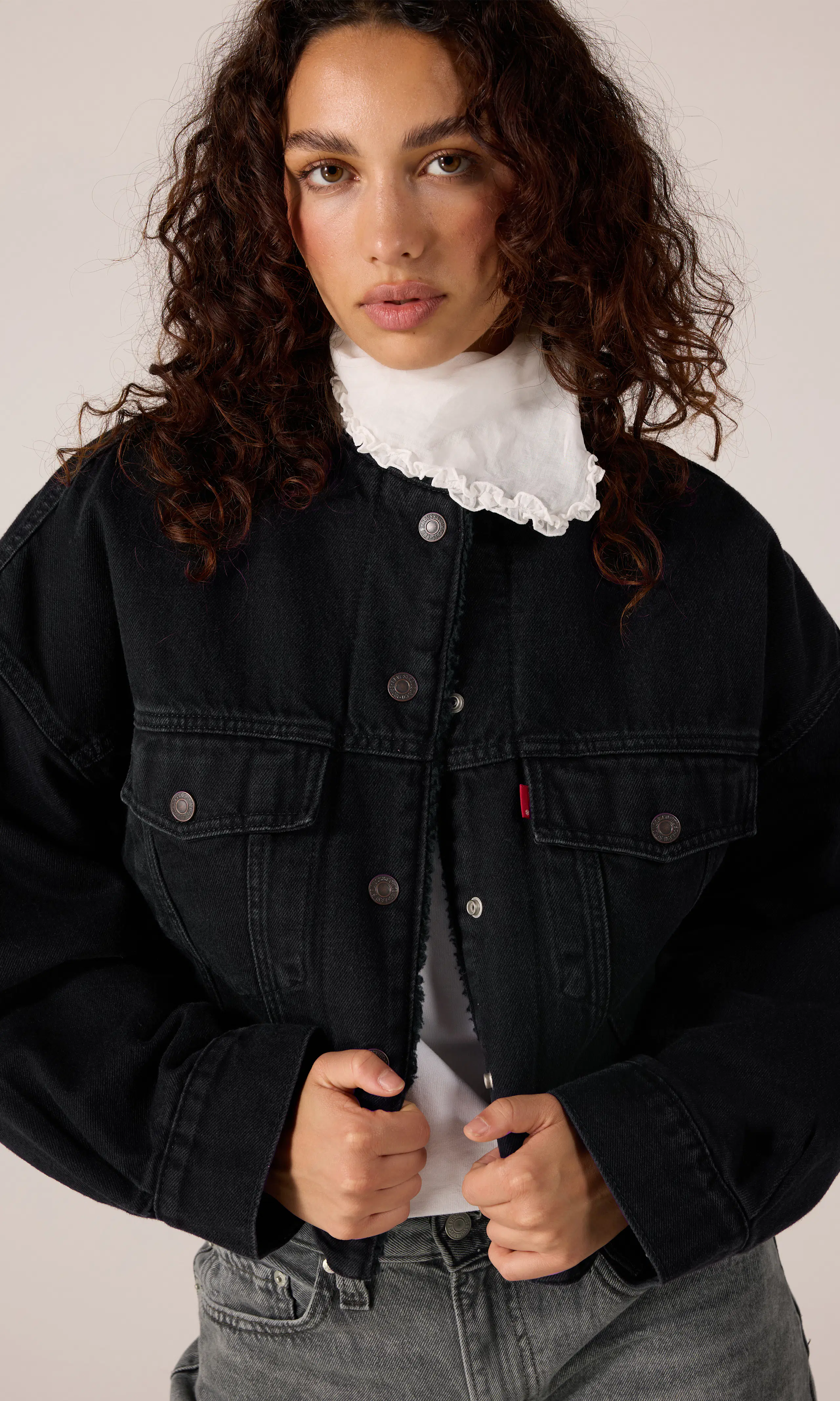 Collarless Crop Sherpa Trucker. Front. Model.