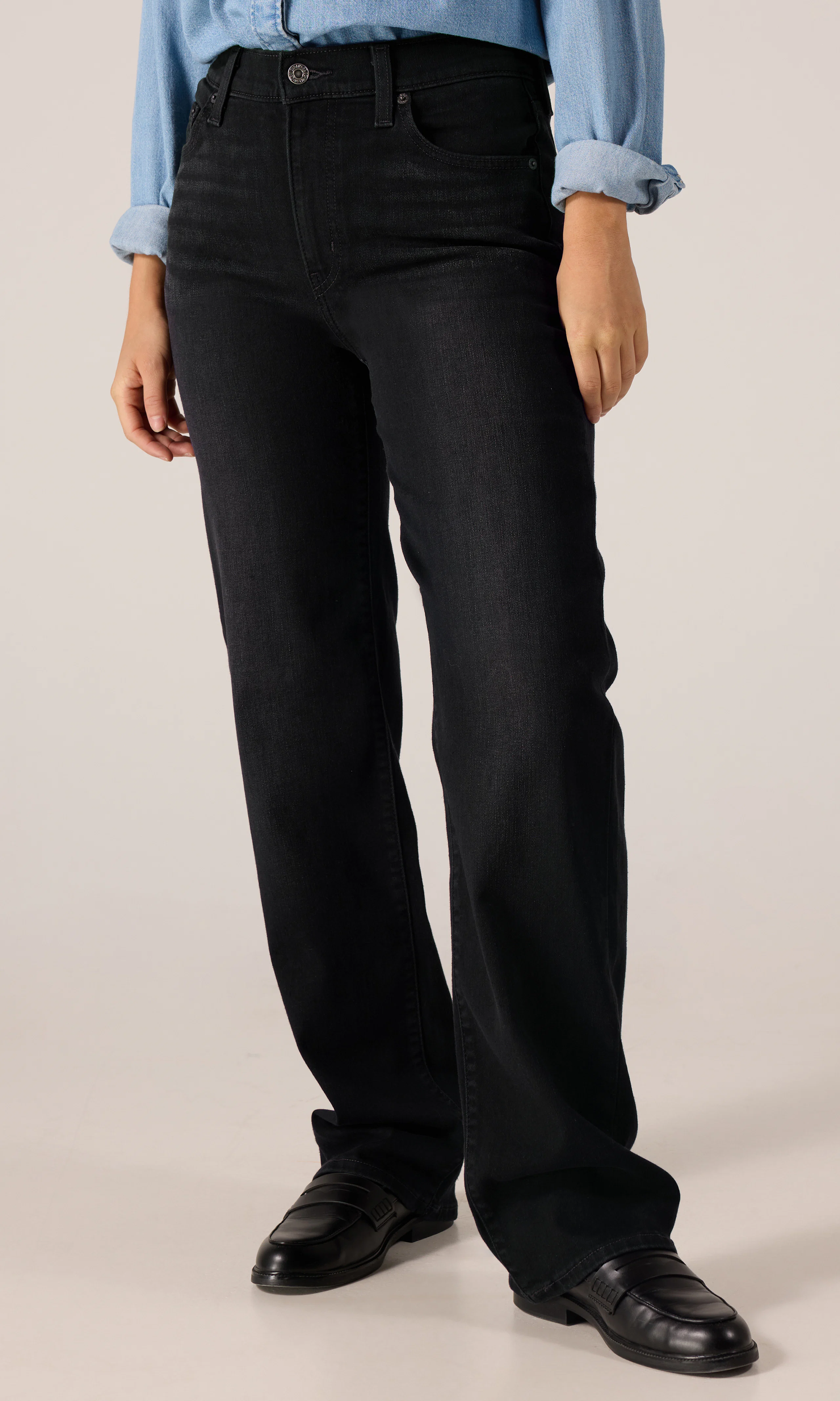 723™ High Rise Straight Jeans. Front. Model.