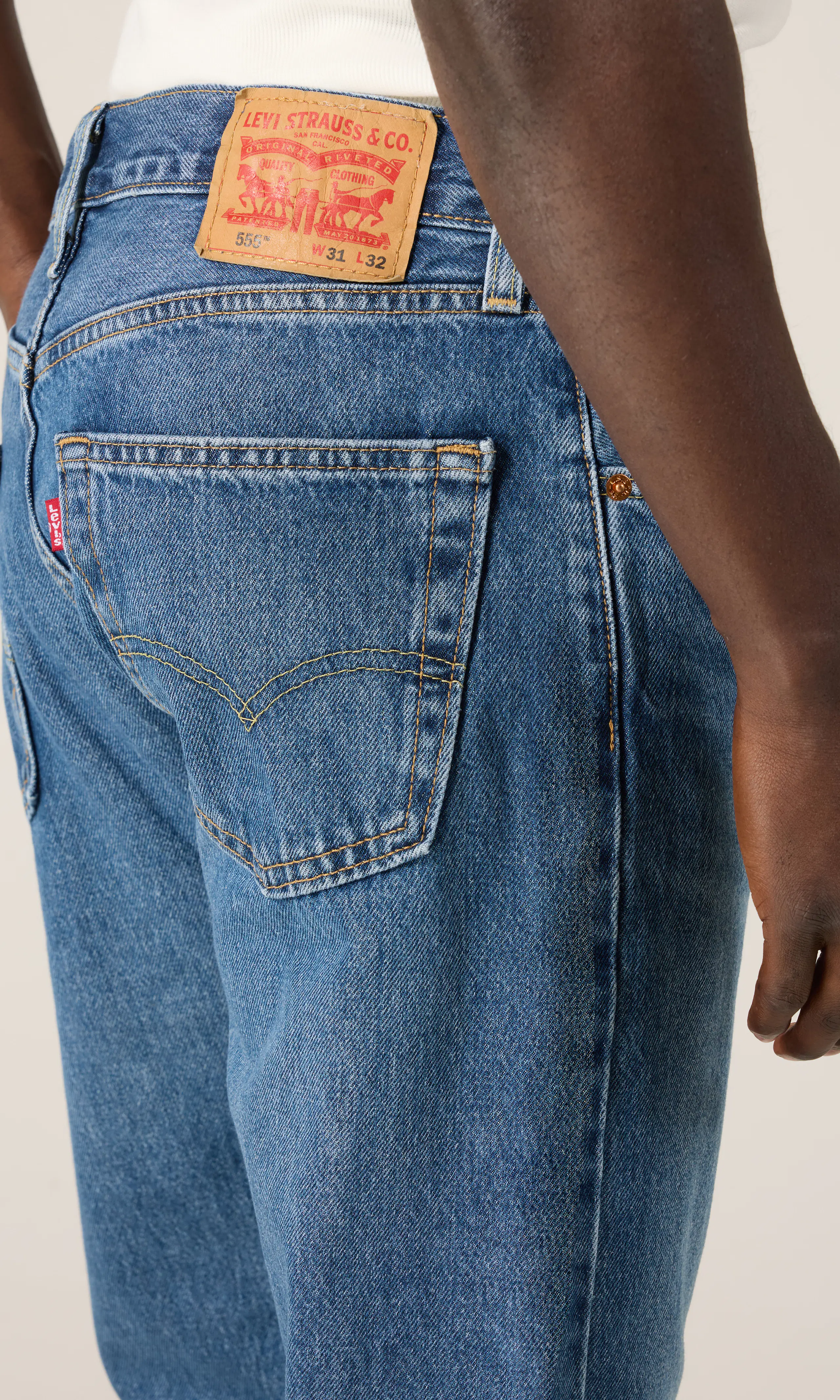 555™ Relaxed Straight Jeans. Detail 2. Model.