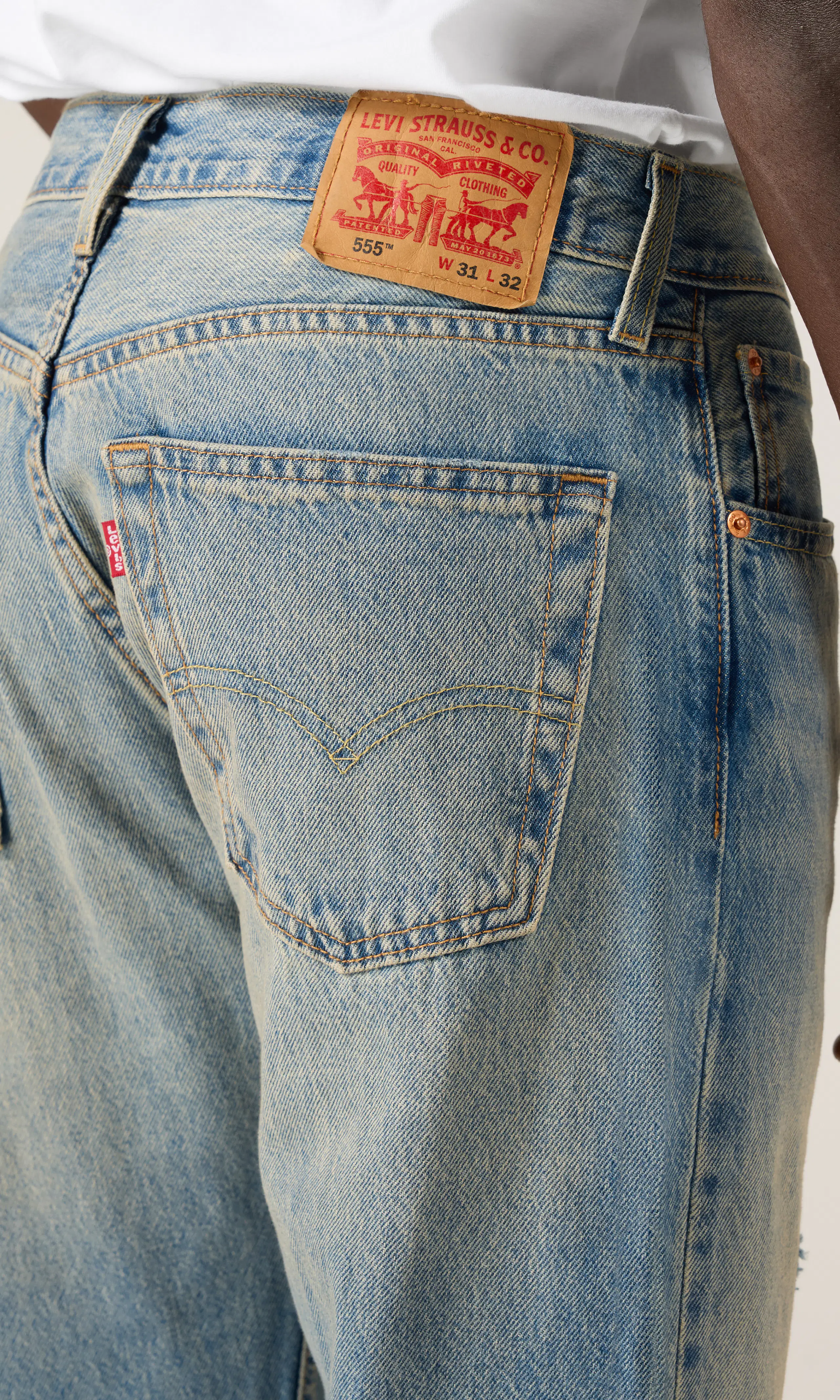 555™ Relaxed Straight Jeans. Detail 2. Model.