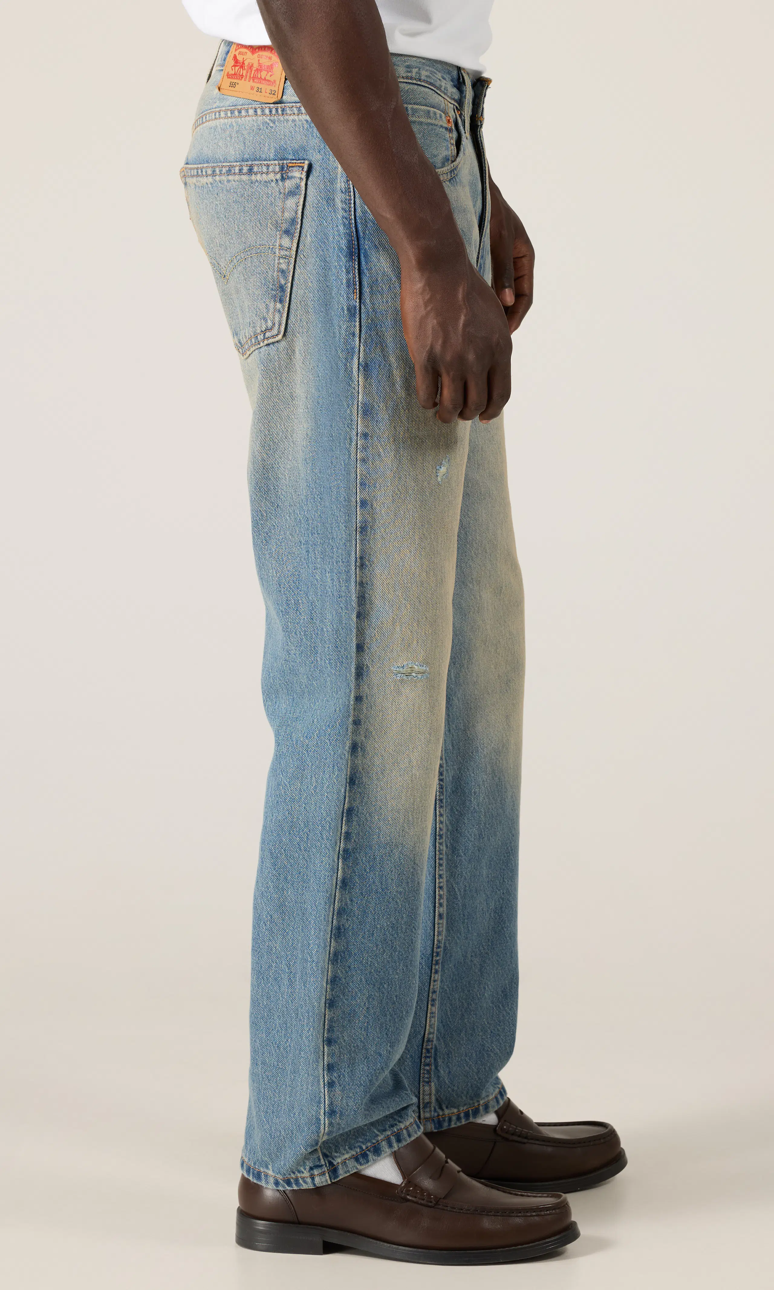 555™ Relaxed Straight Jeans. Front 2. Model.