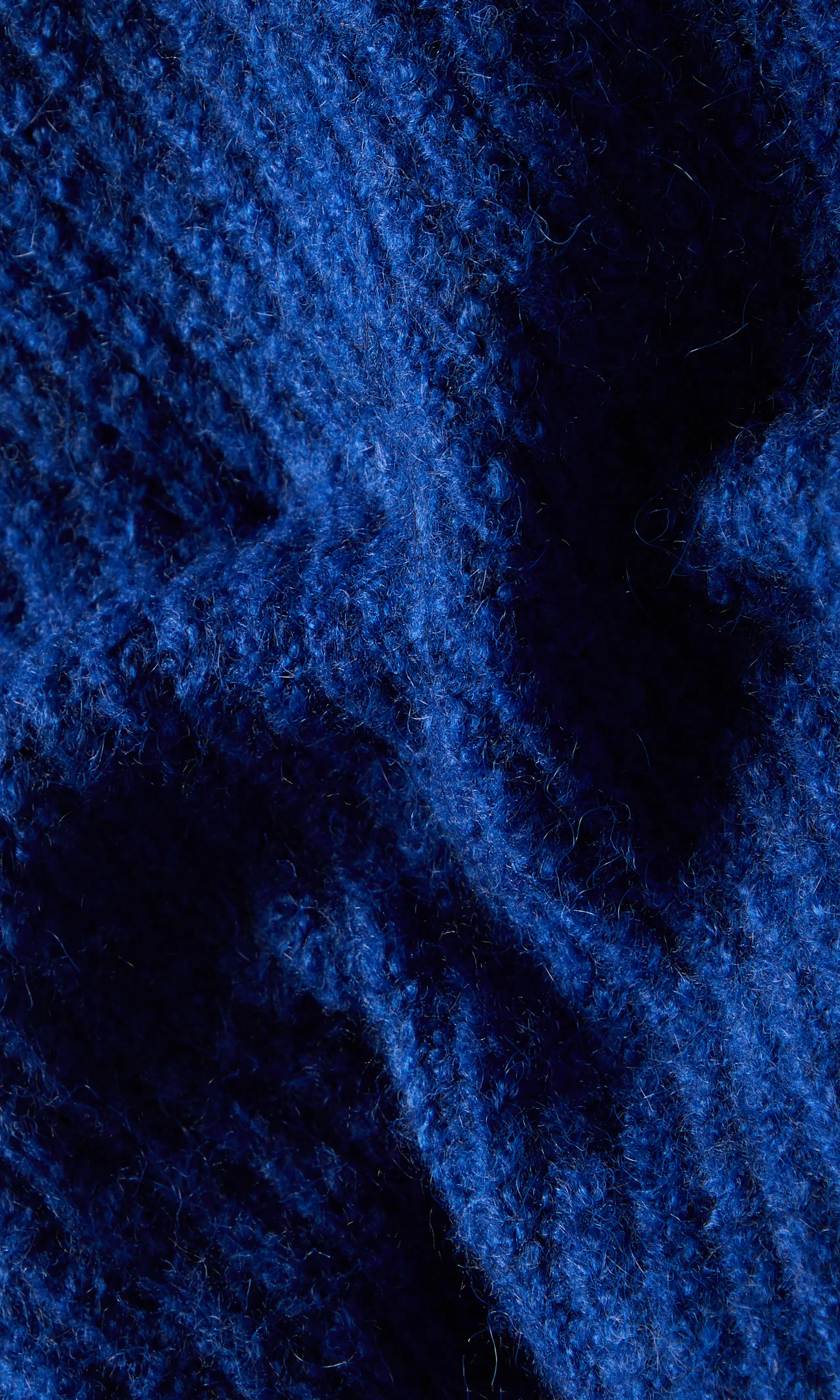Fia Stickad Cardigan. Detail 2. Flat.