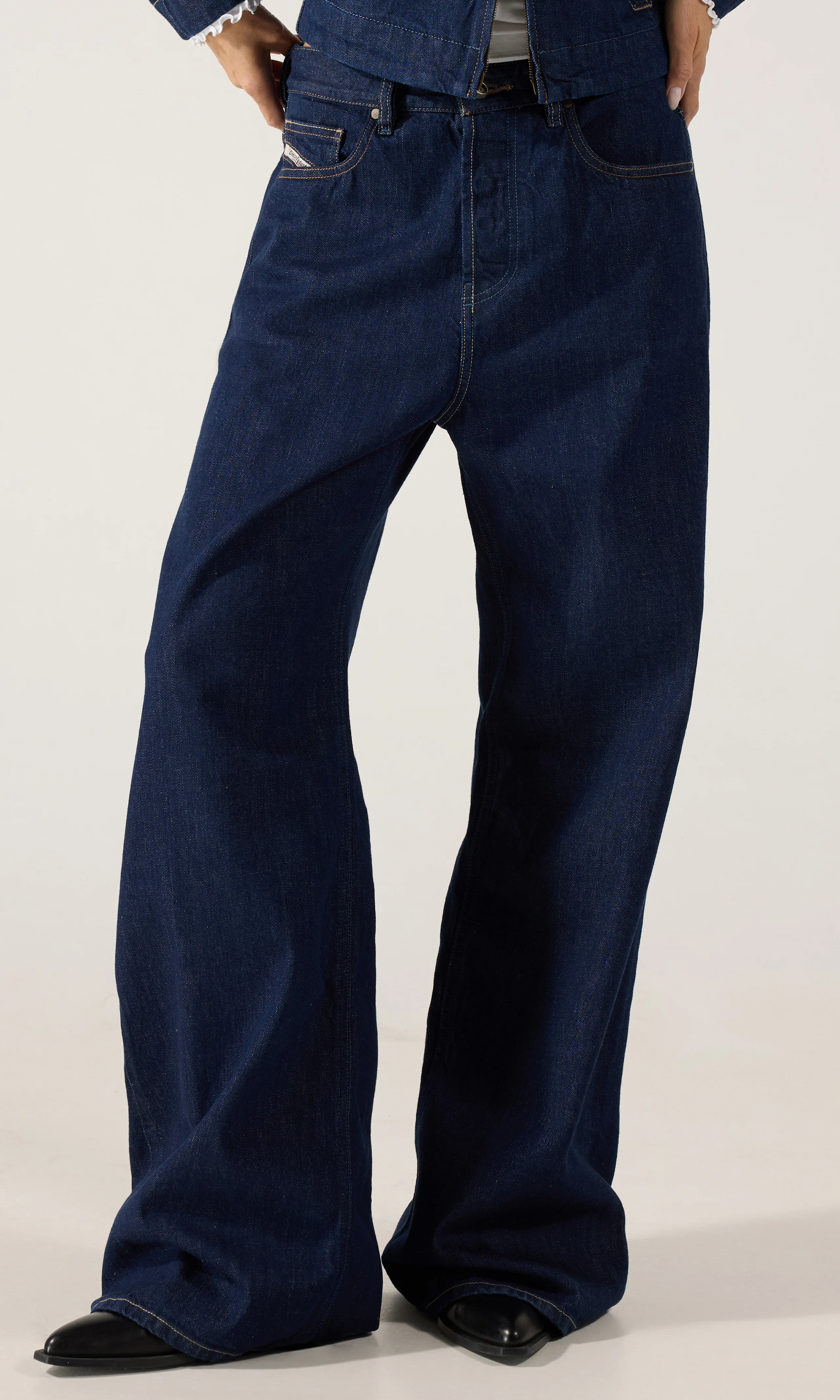 1996 D-Sire Rinsed Jeans. Front. Model.