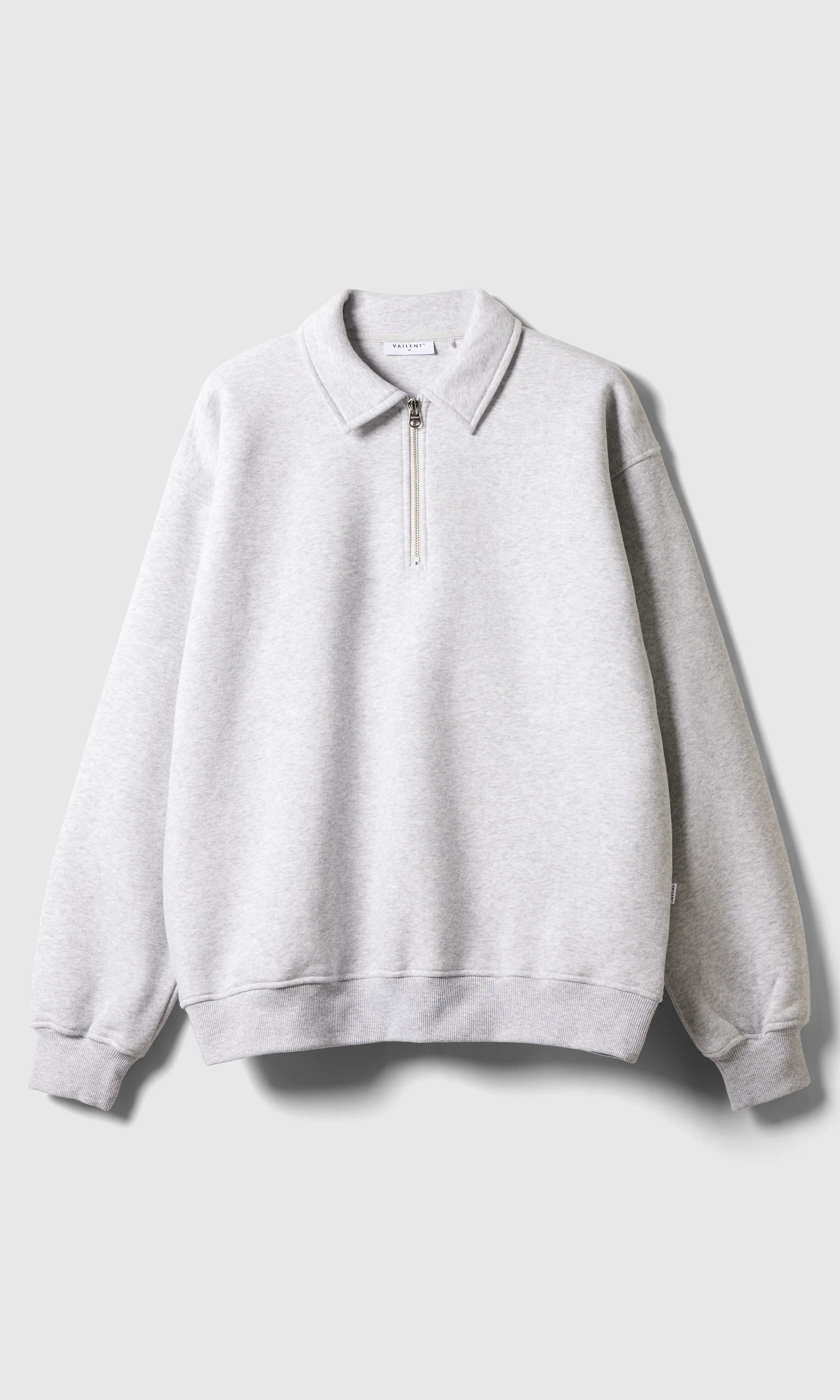 Zip Polo Genser. Front. Flat.