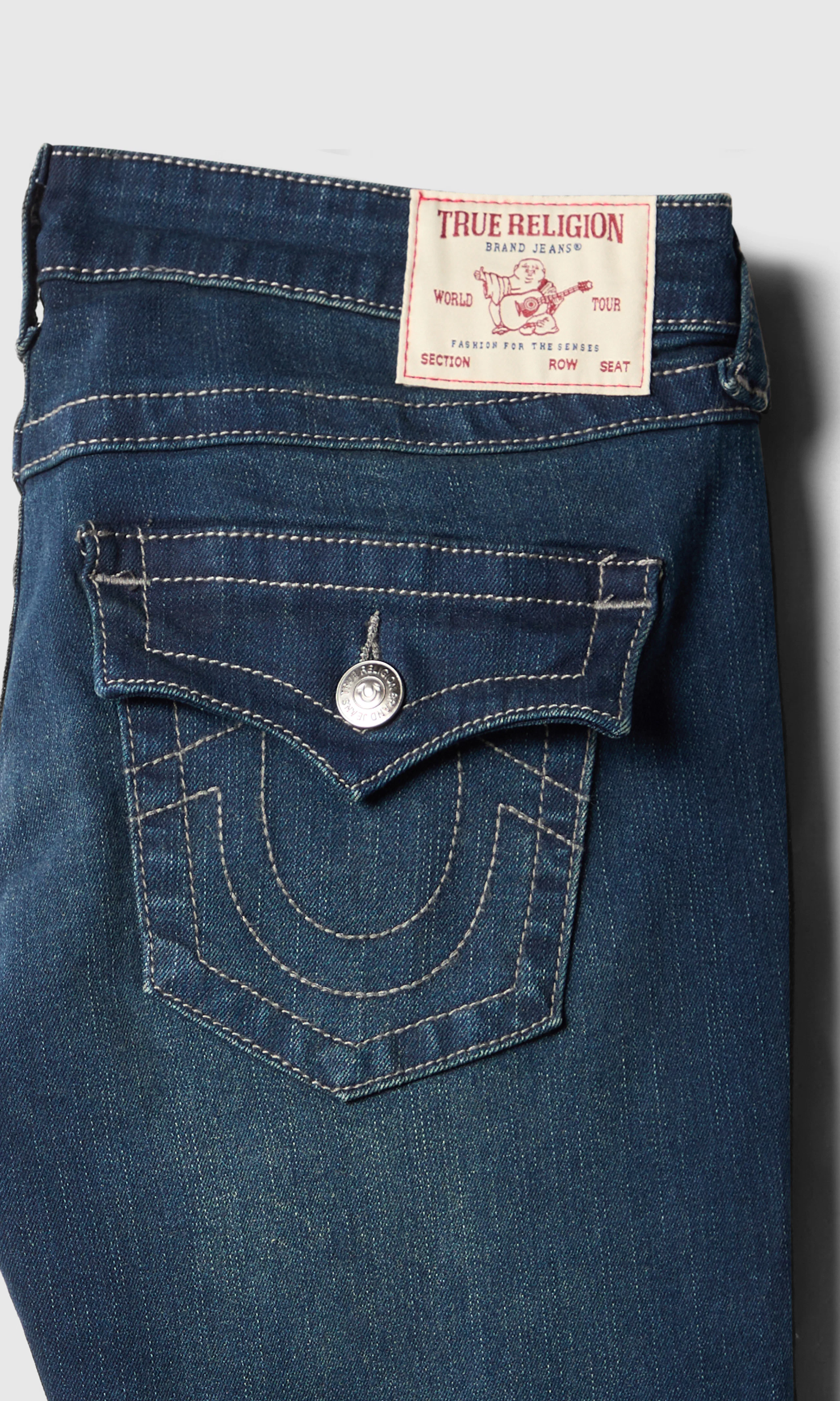 Joey Low Rise Flare Flap Jeans. Detail 1. Flat.