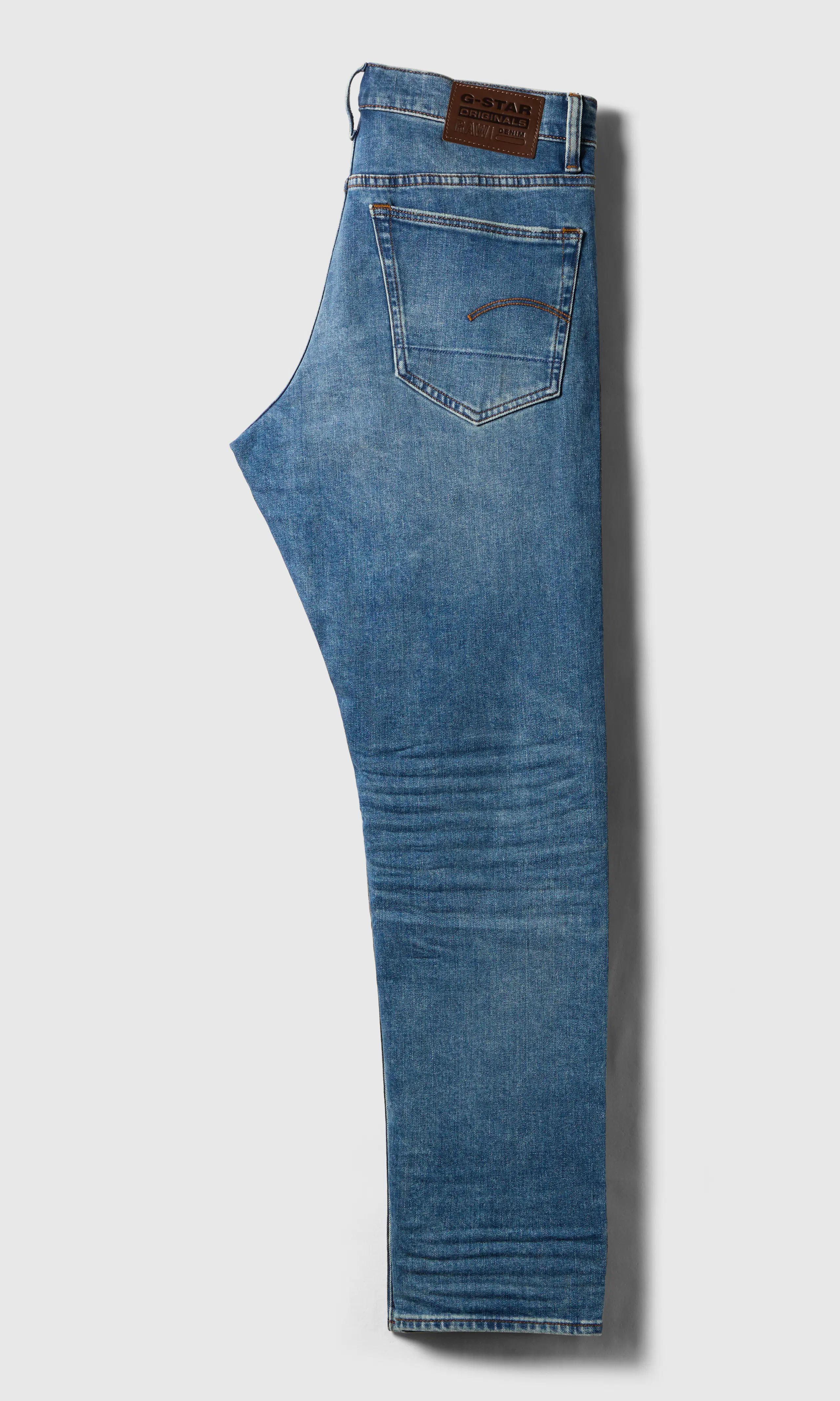 3301 Regular Tapered Lys Blå Jeans. Back. Flat.