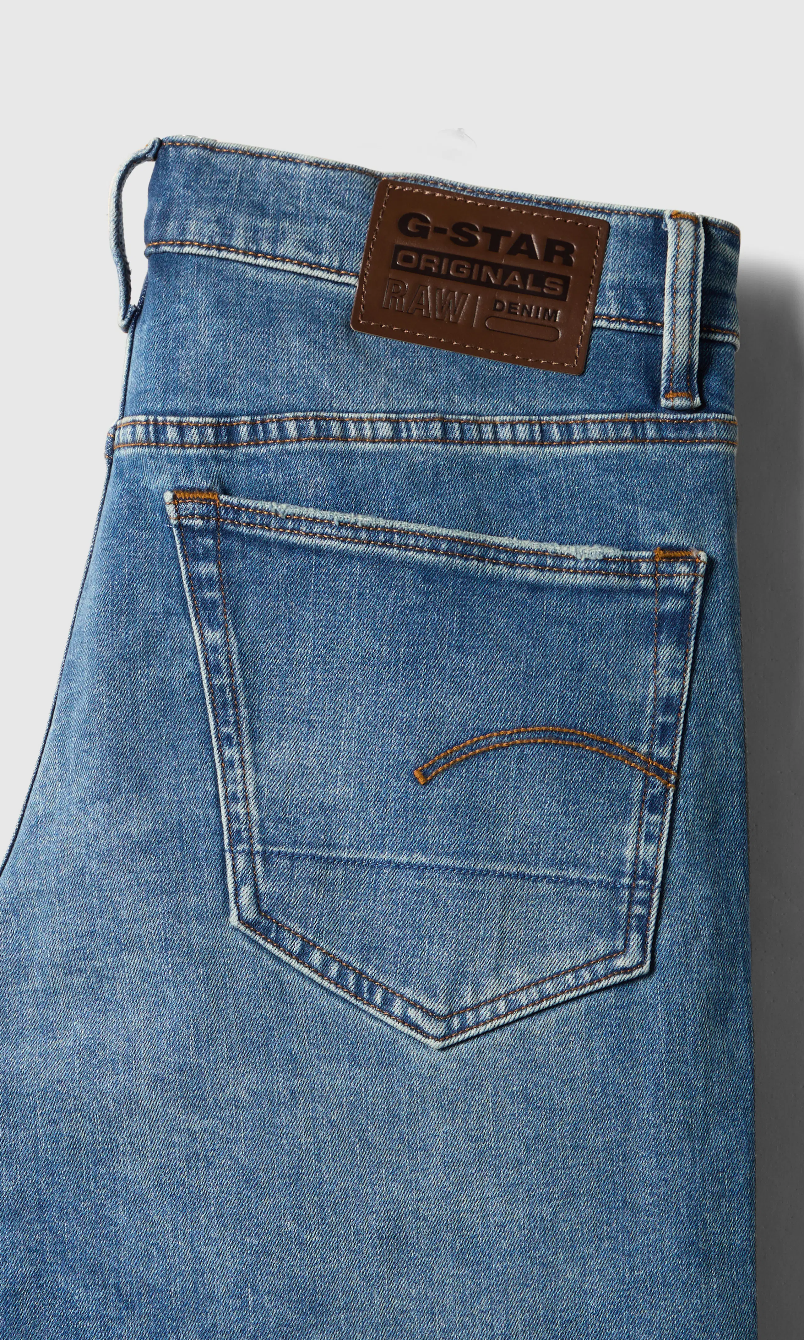 3301 Regular Tapered Lys Blå Jeans. Detail 1. Flat.