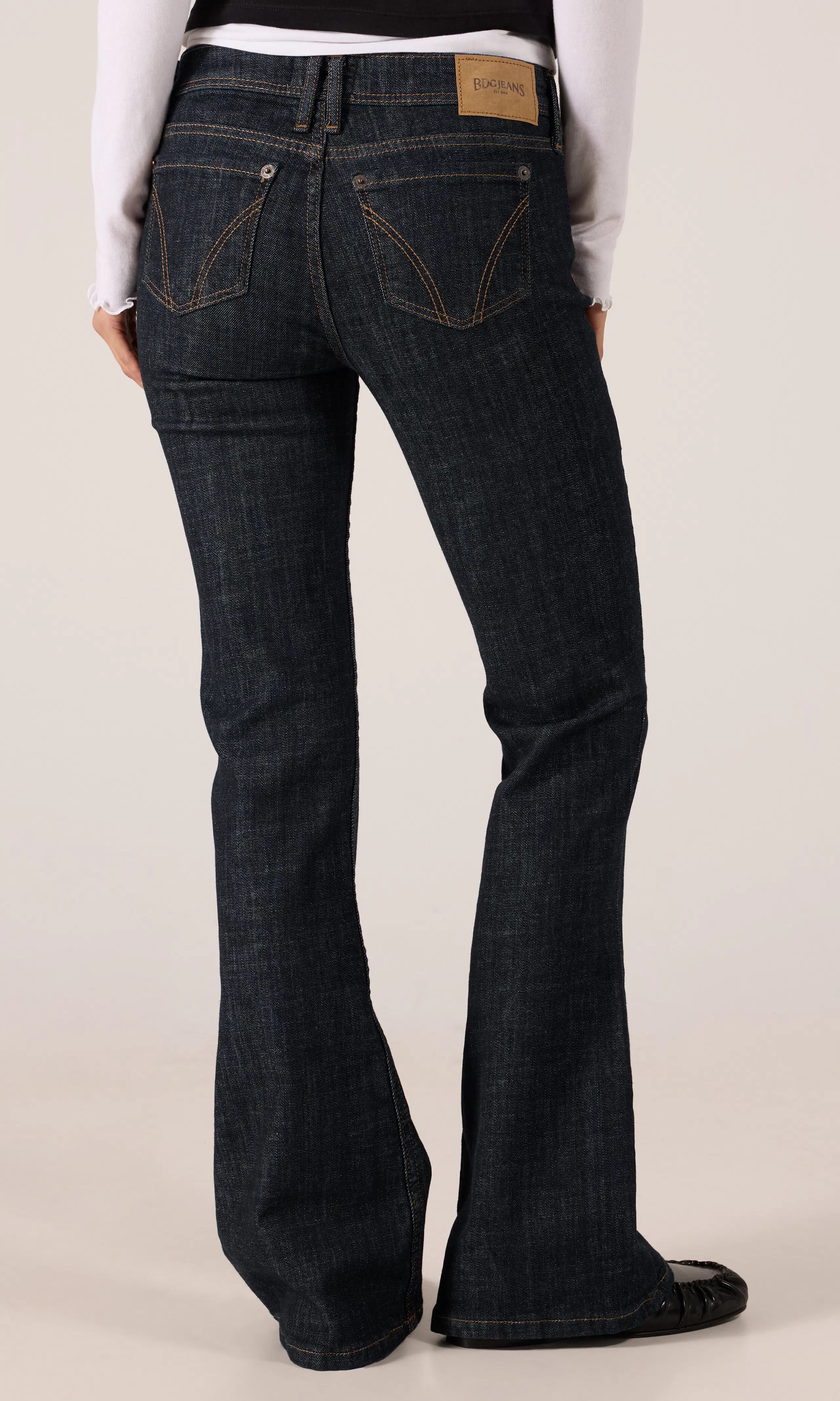 Brooke Flare Jeans. Back. Model.